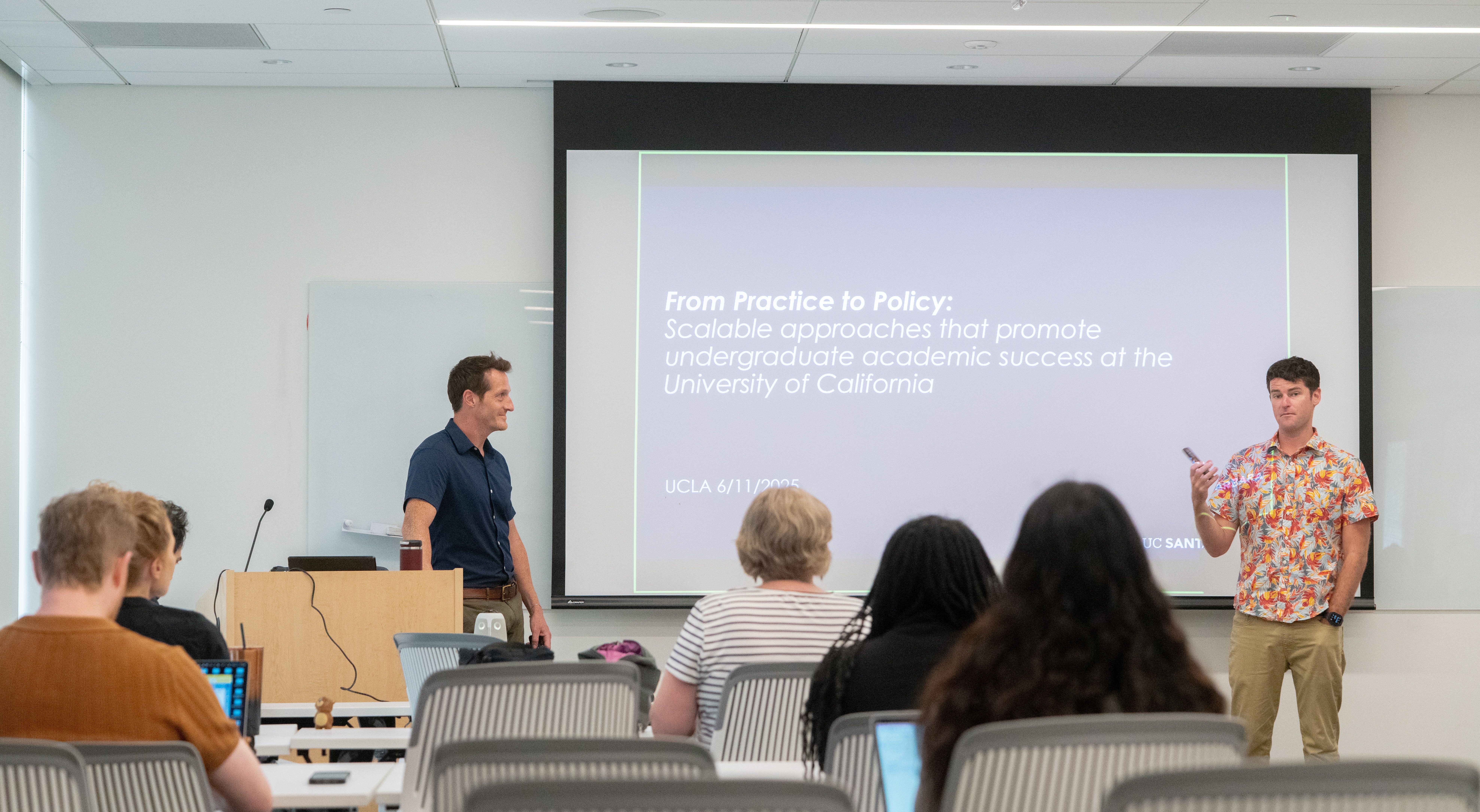 Photo of lecturer delivering presentation