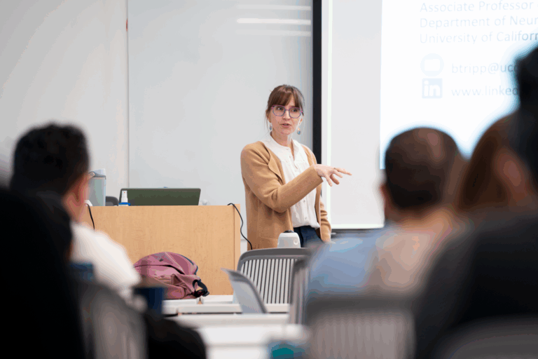 Scholarly Teaching Seminar speaker Brie Tripp lectures in front of the audience