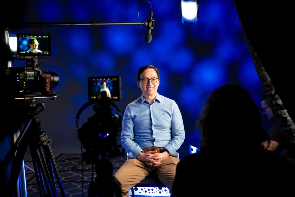 Distinguished Teaching Award recipient Edward Ha being filmed on a TLC set.
