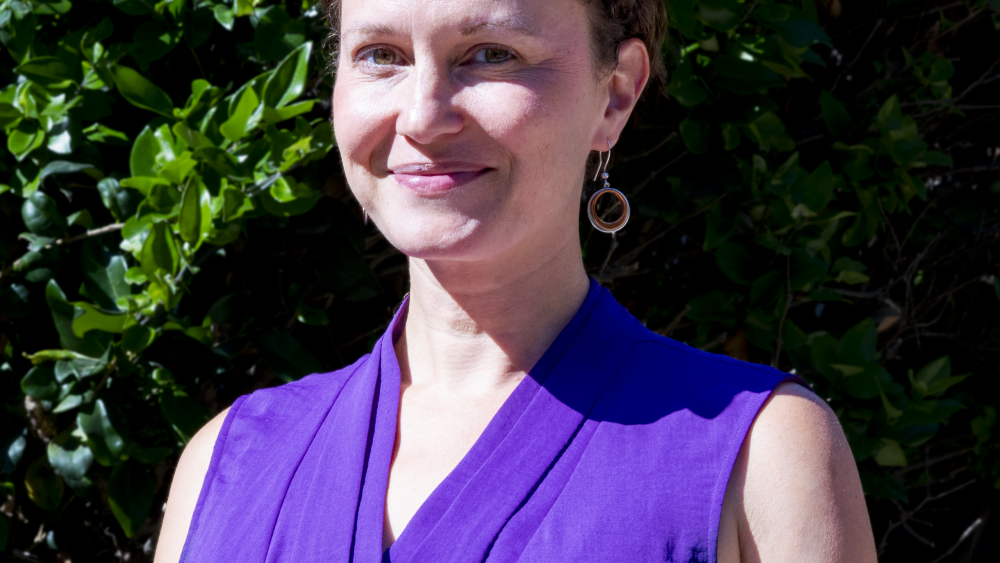 Headshot of Jess Greg