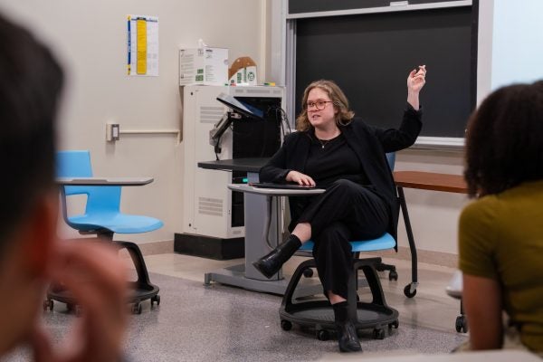 CUTF Instructor Katherine Smock lectures in a seminar