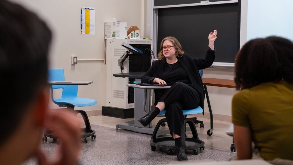 CUTF Instructor Katherine Smock lectures in a seminar
