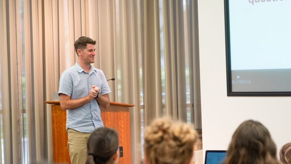 Jeff Maloy, an associate professor of teaching, presents to an audience.