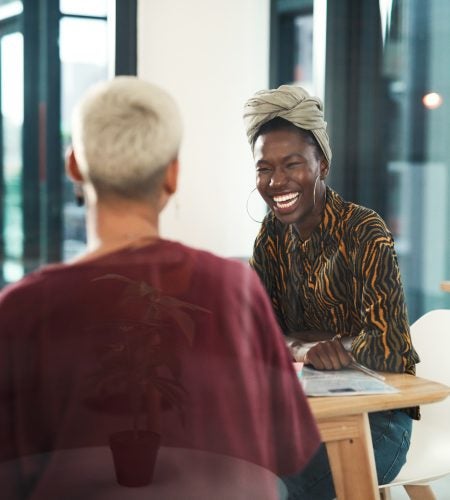 Photo of people during a meeting in an office