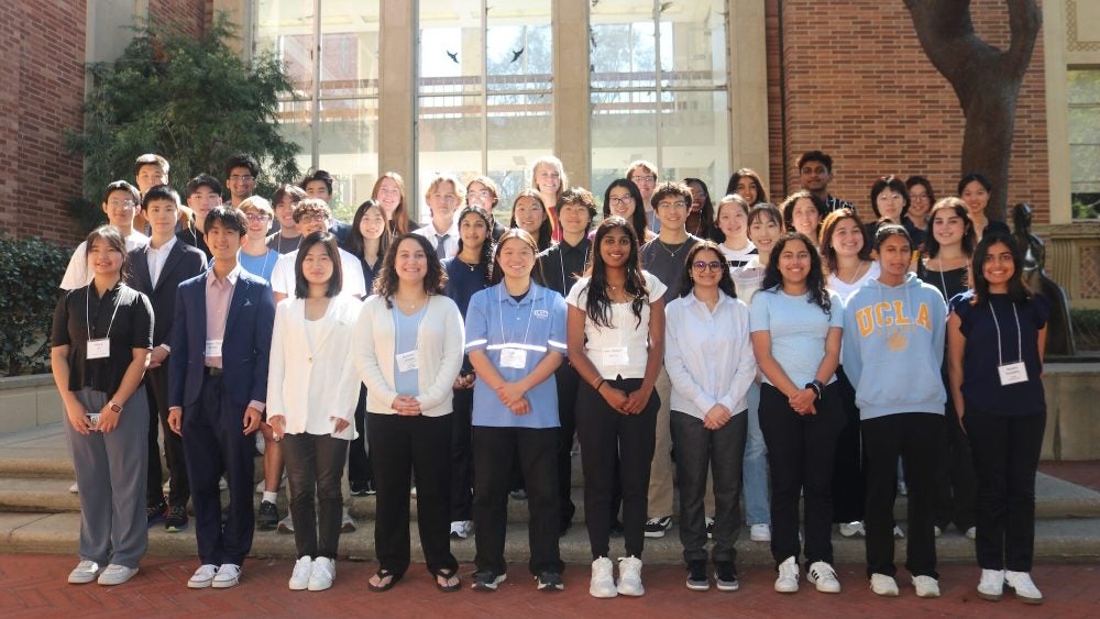 DataX Hackathon students standing outside of Murphy Hall