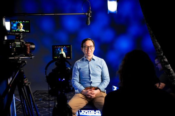 Distinguished Teaching Award recipient Edward Ha being filmed on a TLC set.